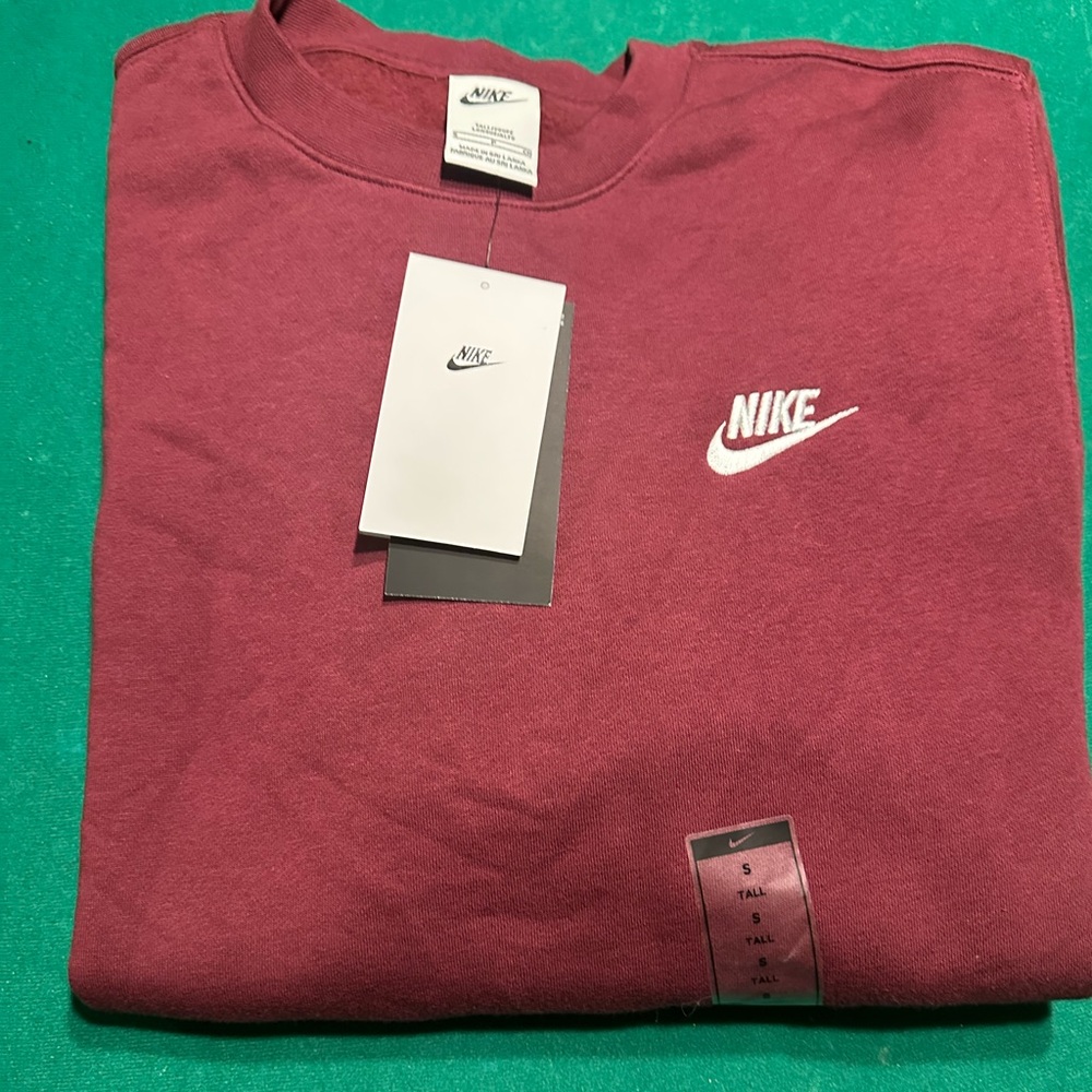 Upgrade your style with this Burgundy Nike Crew Neck